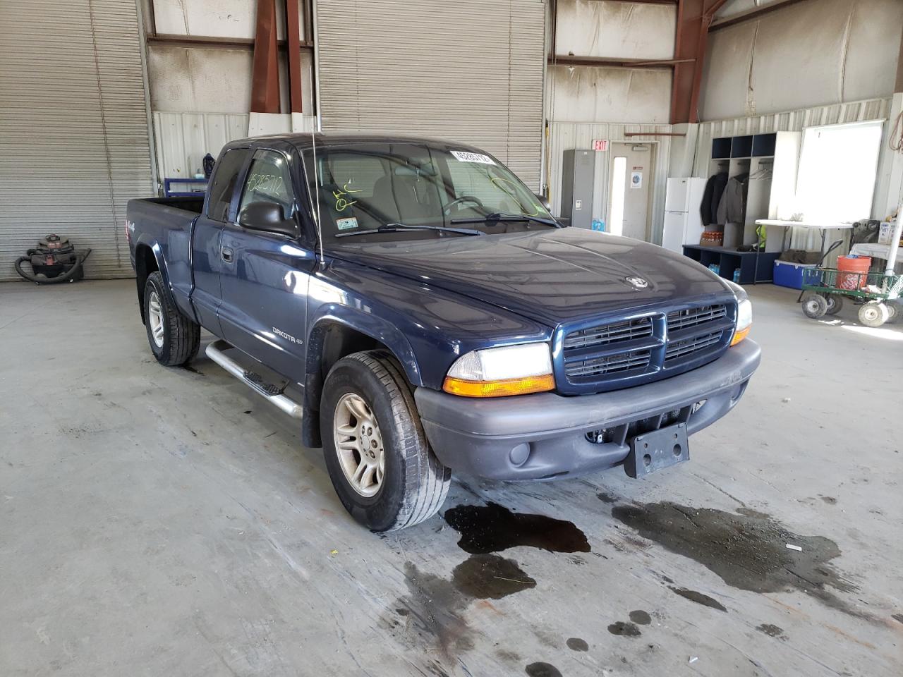 DODGE DAKOTA SXT 2003 with VIN 1D7HG12X43S296198 - Photo from auction