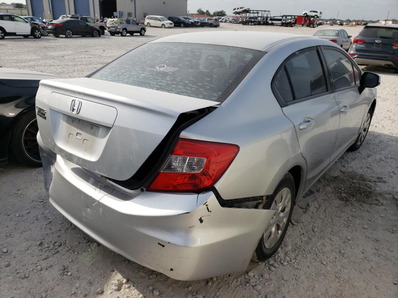 Photo 16 from auction – 2012 HONDA CIVIC LX with VIN 2HGFB2F57CH301515