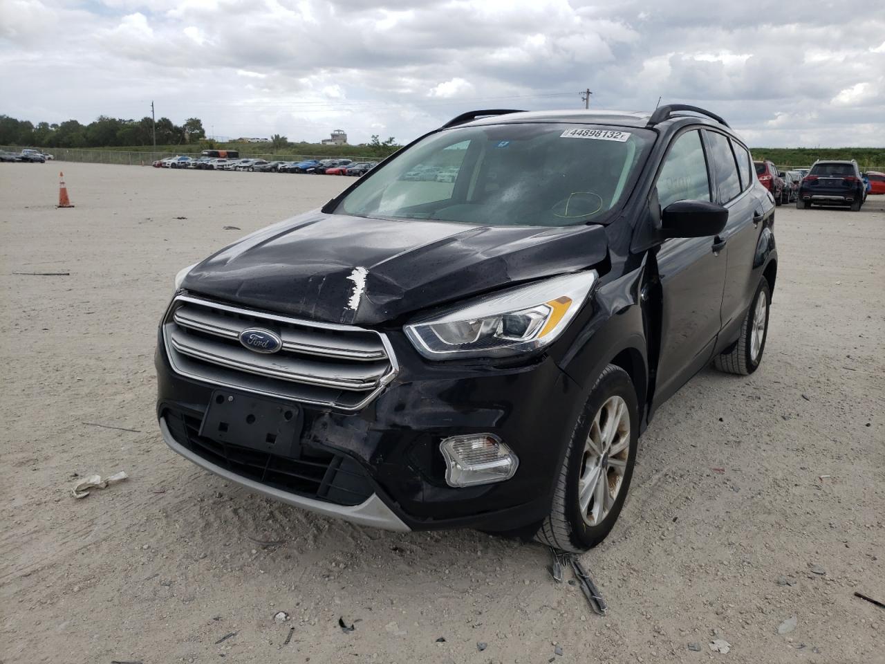 Photo 9 from auction – 2017 FORD ESCAPE SE with VIN 1FMCU9GD1HUB94388