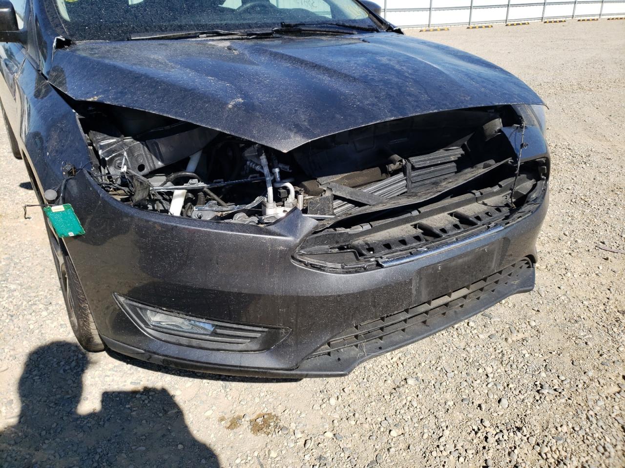 Photo 9 from auction – 2018 FORD FOCUS SEL with VIN 1FADP3M20JL217337