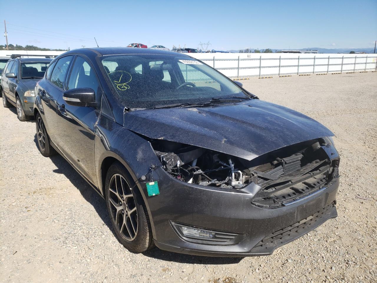 FORD FOCUS SEL 2018 with VIN 1FADP3M20JL217337 - Photo from auction