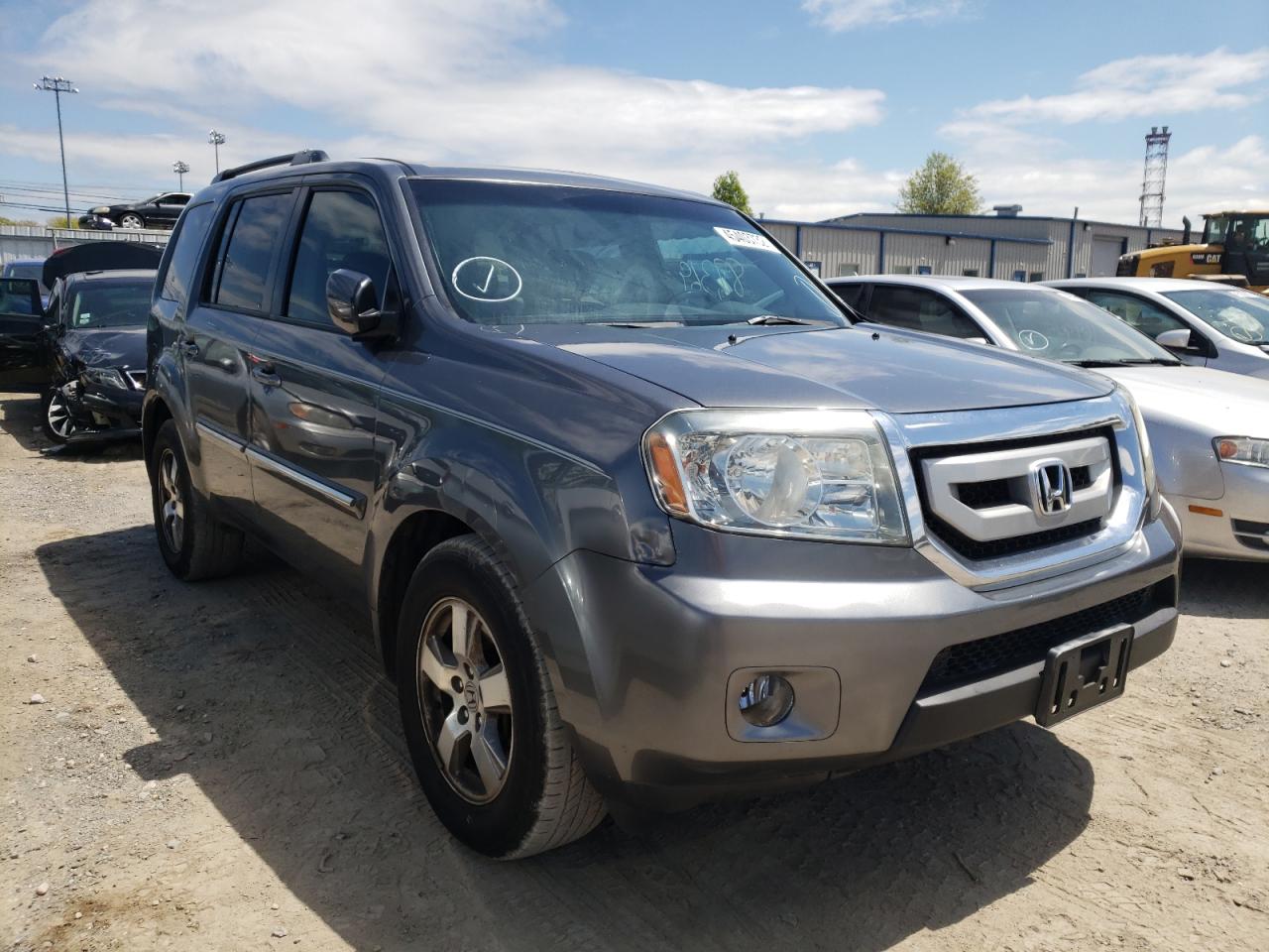 HONDA PILOT EXL 2011 with VIN 5FNYF4H62BB043891 - Photo from auction