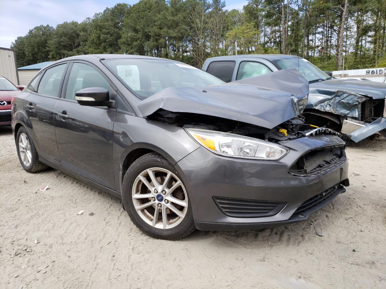 FORD FOCUS SE 2016 with VIN 1FADP3F23GL219055 - Photo from auction