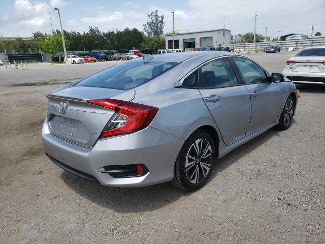 Photo 4 from auction – 2017 HONDA CIVIC EXL with VIN 19XFC1F75HE007122