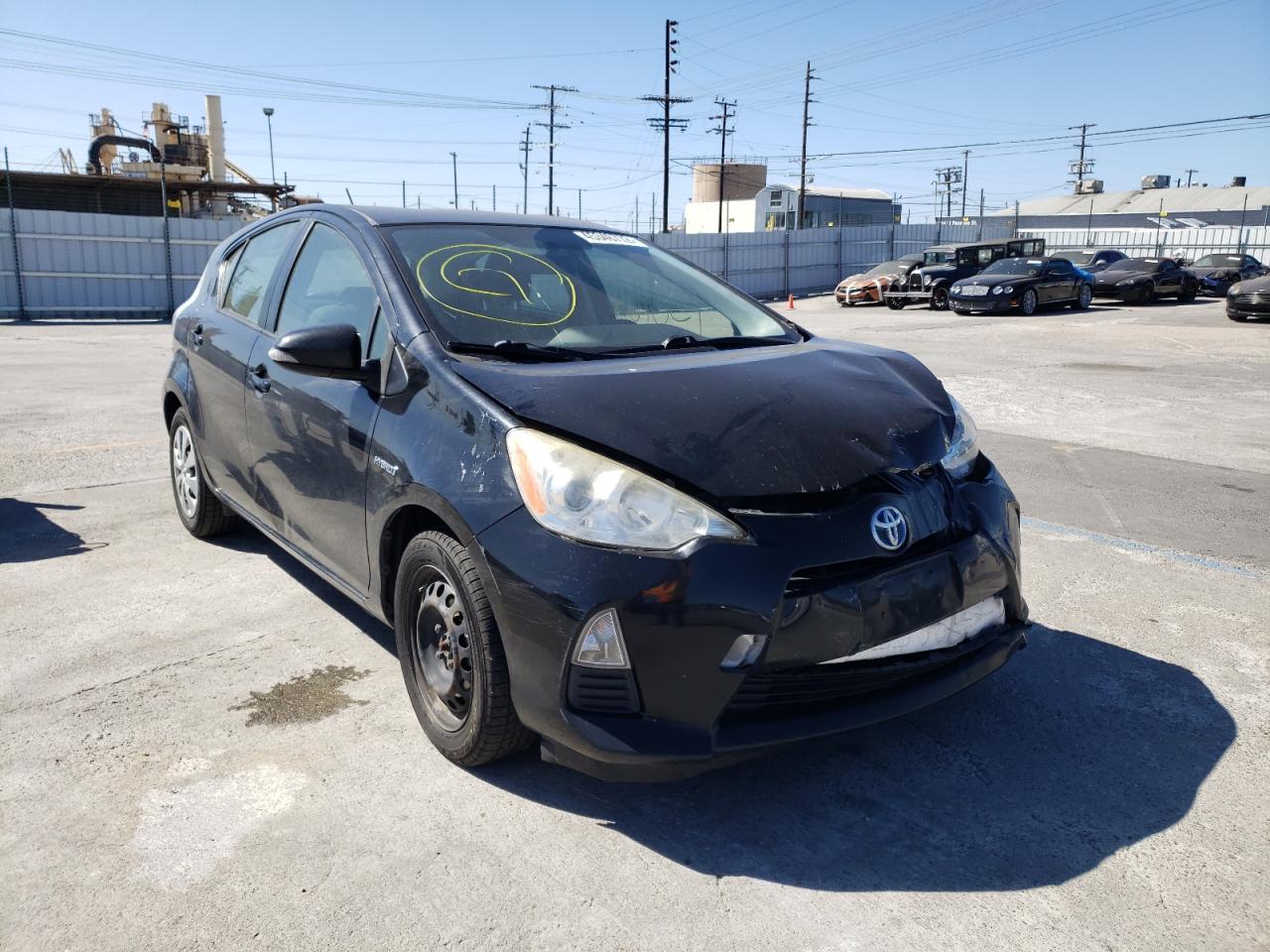 TOYOTA PRIUS C 2013 with VIN JTDKDTB32D1051392 - Photo from auction