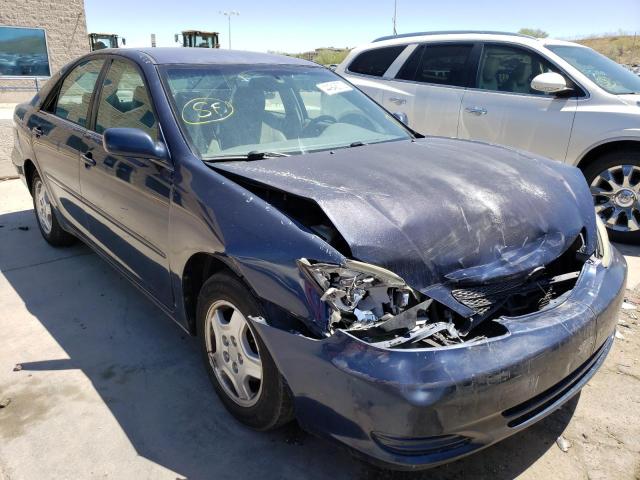 TOYOTA CAMRY LE 2002 with VIN 4T1BF32KX2U524092 - Photo from auction