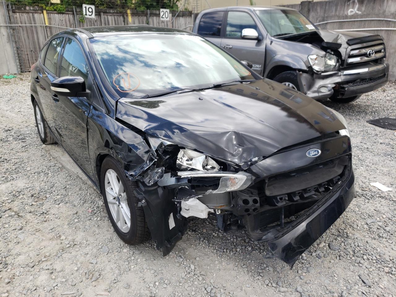 FORD FOCUS SE 2017 with VIN 1FADP3K25HL251898 - Photo from auction