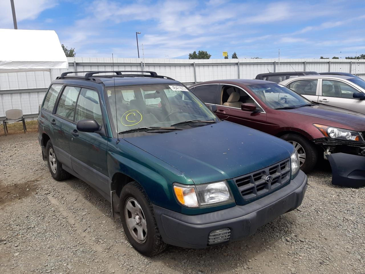 SUBARU FORESTER L 1998 with VIN JF1SF6354WH768355 - Photo from auction