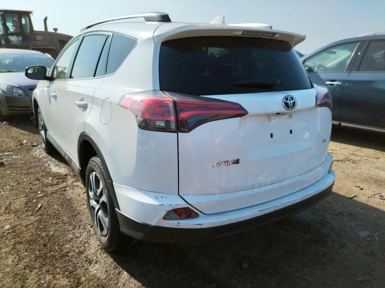 Photo 3 from auction – 2017 TOYOTA RAV4 LE with VIN JTMZFREV4HJ710300