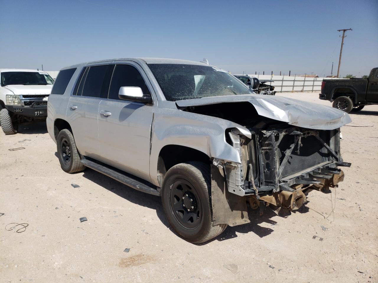 CHEVROLET TAHOE POLI 2019 with VIN 1GNLCDEC6KR248791 - Photo from auction