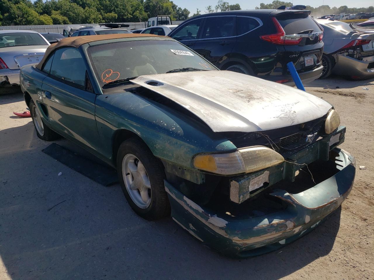 FORD MUSTANG 1996 with VIN 1FALP4445TF140503 - Photo from auction