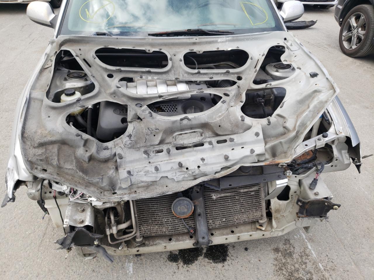 Photo 9 from auction – 2004 KIA SPECTRA BA with VIN KNAFB121045314821