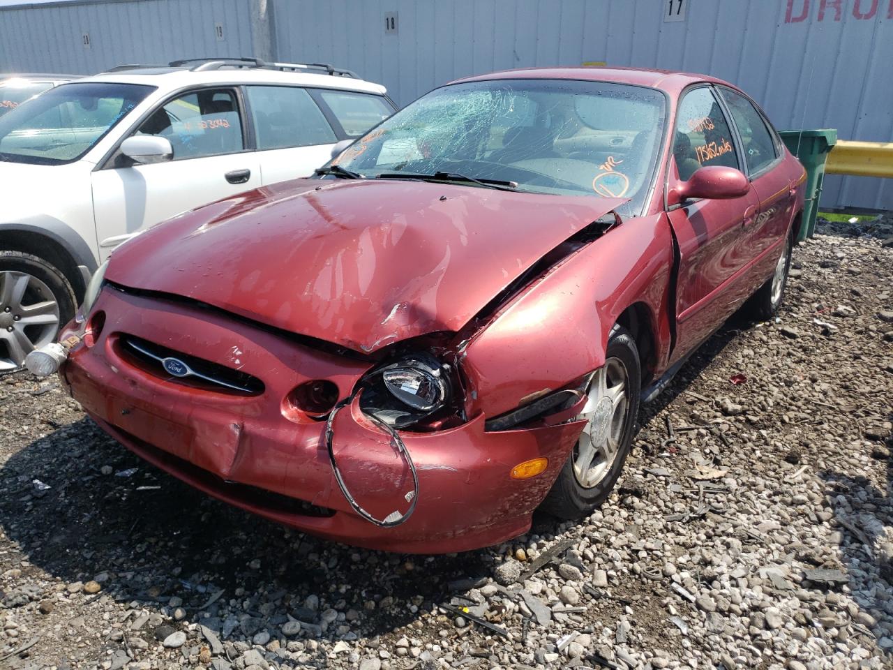 Photo 2 from auction – 1999 FORD TAURUS SE with VIN 1FAFP53U0XA311178