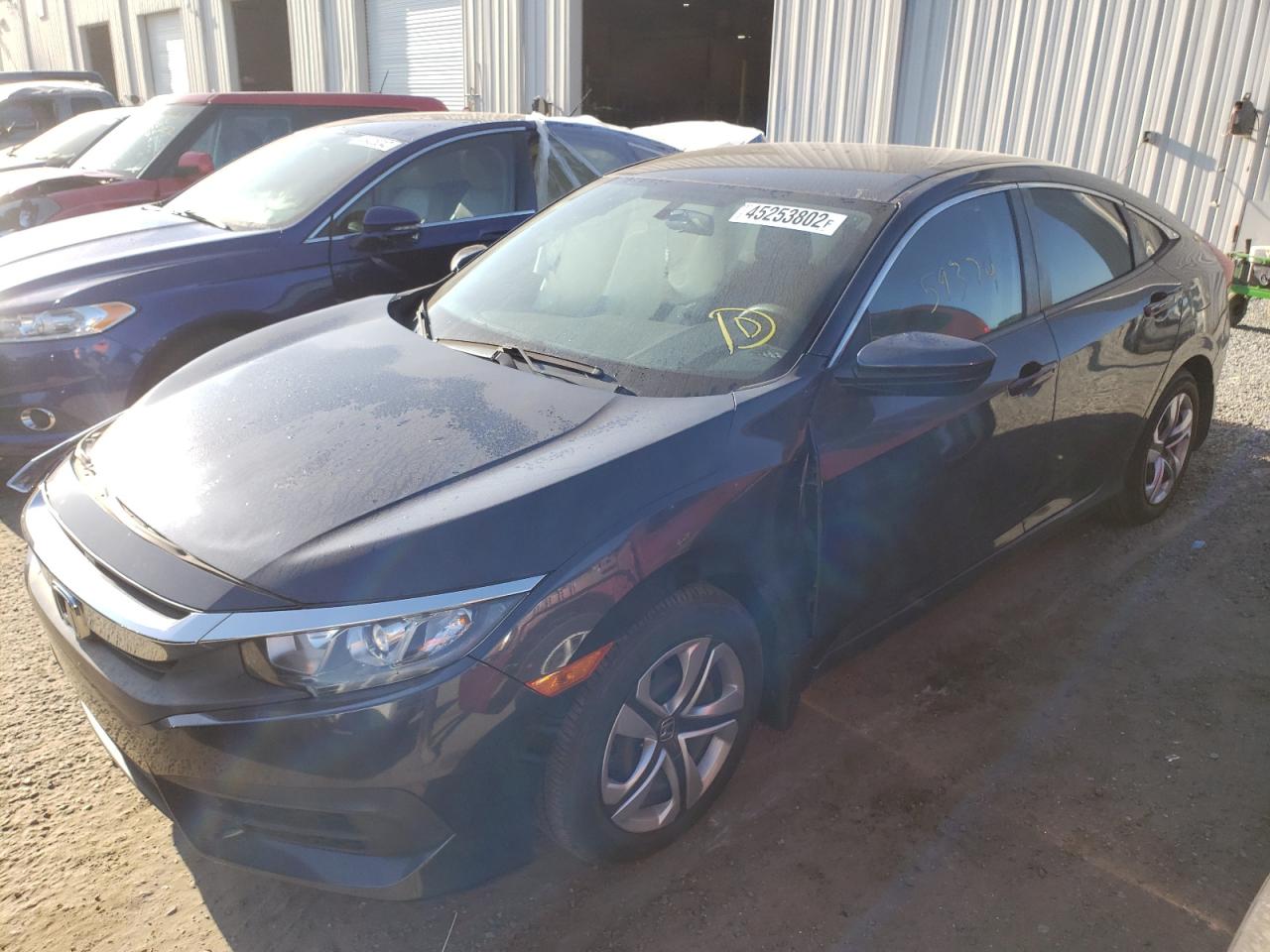 Photo 2 from auction – 2017 HONDA CIVIC LX with VIN 19XFC2F59HE078604