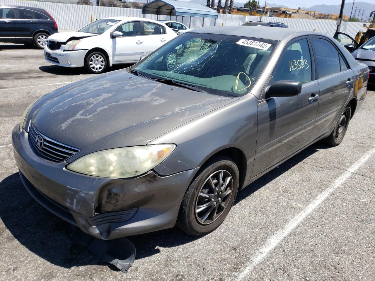 Photo 12 from auction – 2005 TOYOTA CAMRY LE with VIN 4T1BE32K65U983417