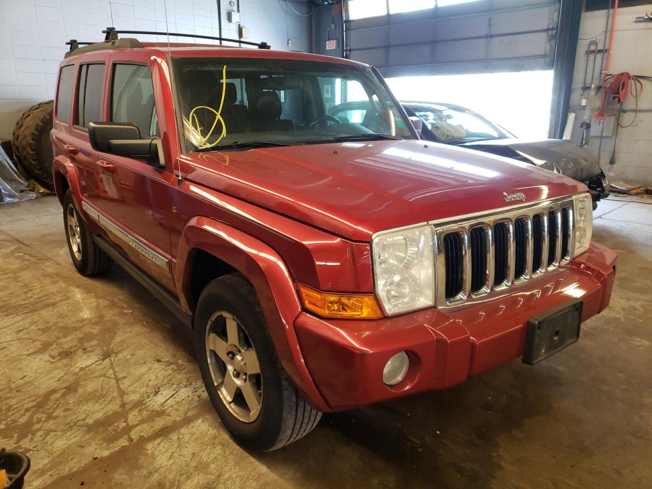 JEEP COMMANDER 2010 with VIN 1J4RG4GK3AC157002 - Photo from auction