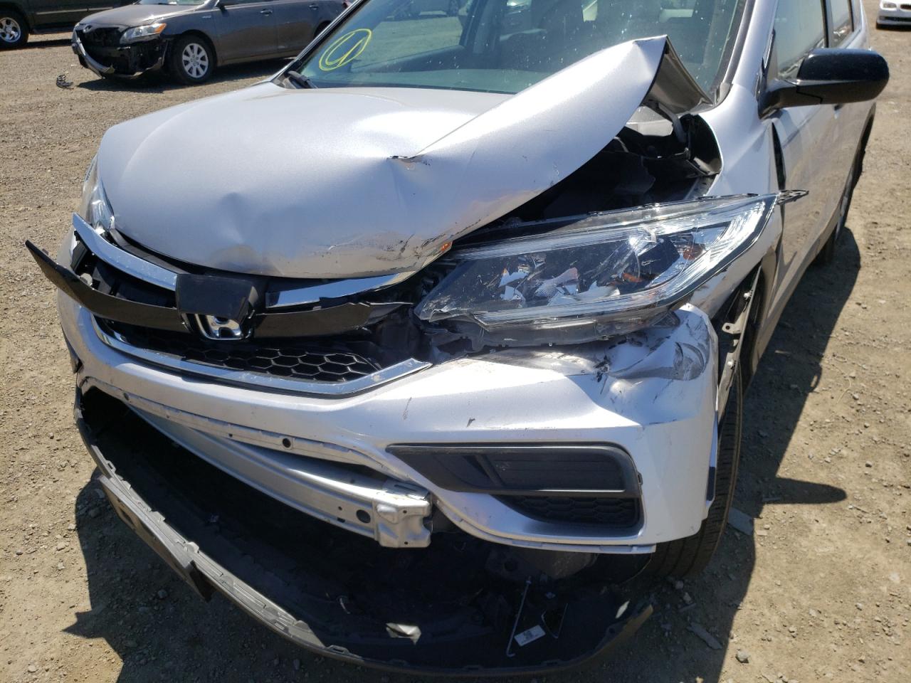 Photo 9 from auction – 2016 HONDA CR-V LX with VIN 2HKRM3H32GH569330