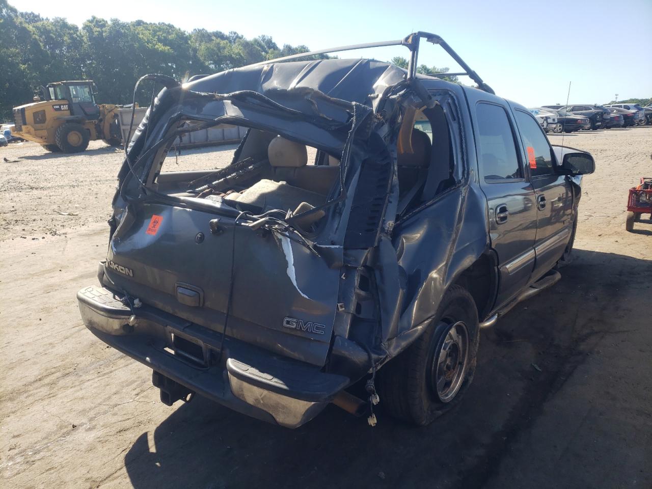 Photo 4 from auction – 2002 GMC YUKON with VIN 1GKEK13Z22R309861