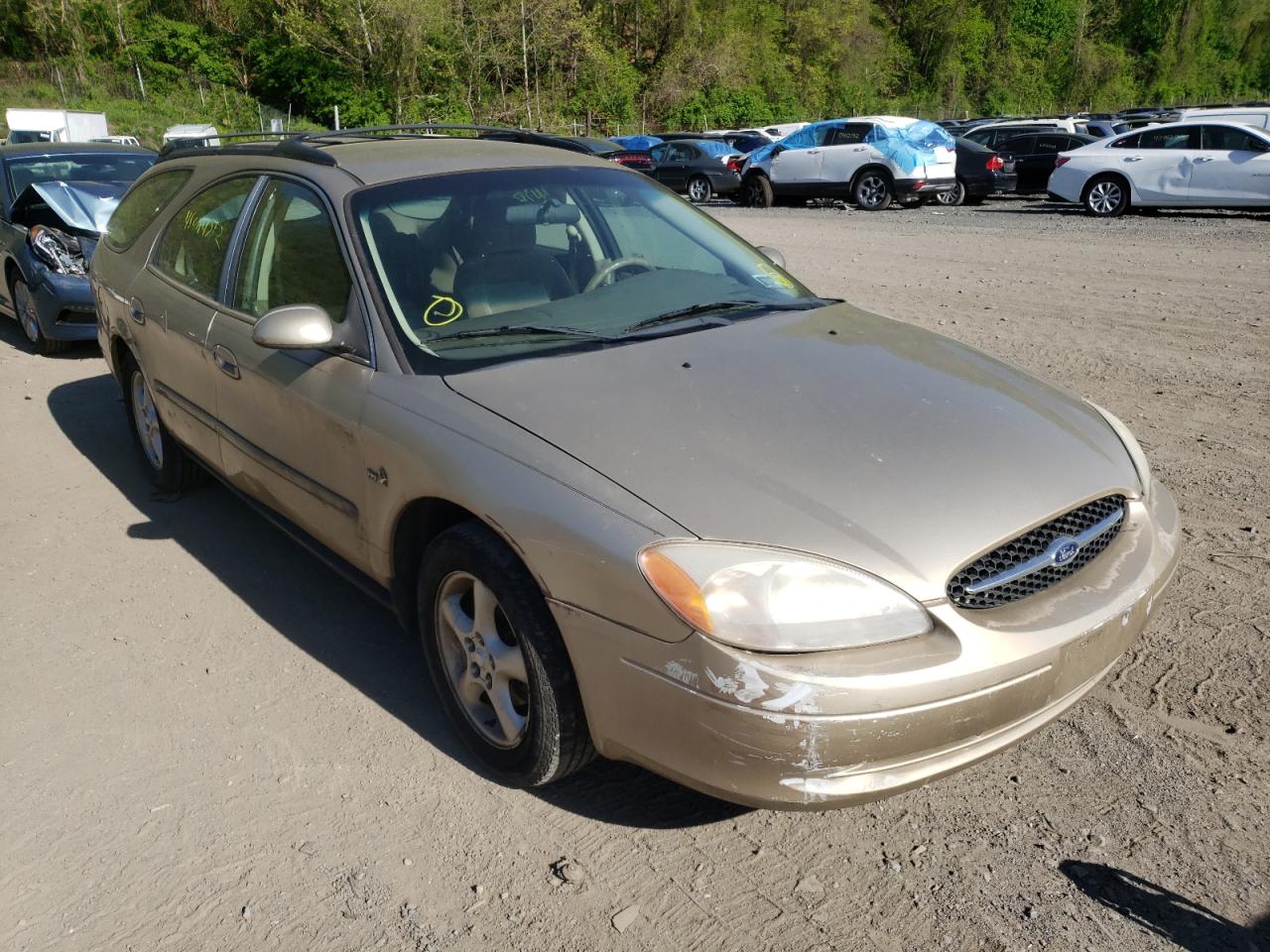 FORD TAURUS 2000 with VIN 1FAFP5824YG184974 - Photo from auction