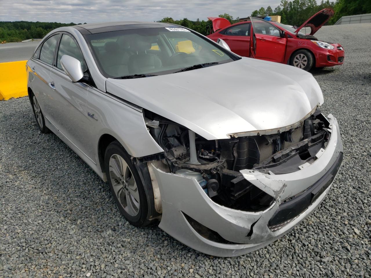 HYUNDAI SONATA HYB 2015 with VIN KMHEC4A46FA127145 - Photo from auction