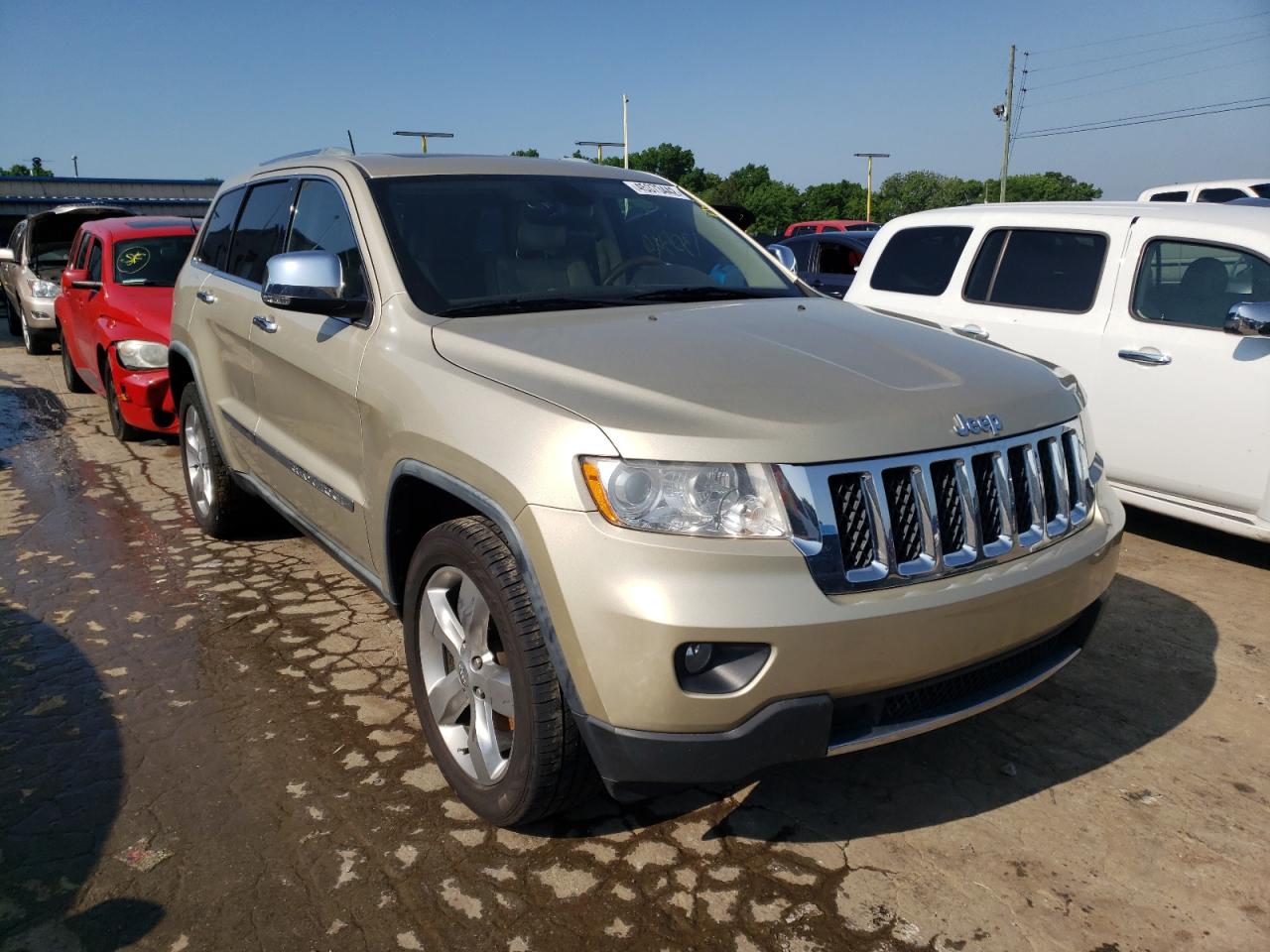 JEEP GRAND CHER 2011 with VIN 1J4RS6GG1BC585190 - Photo from auction