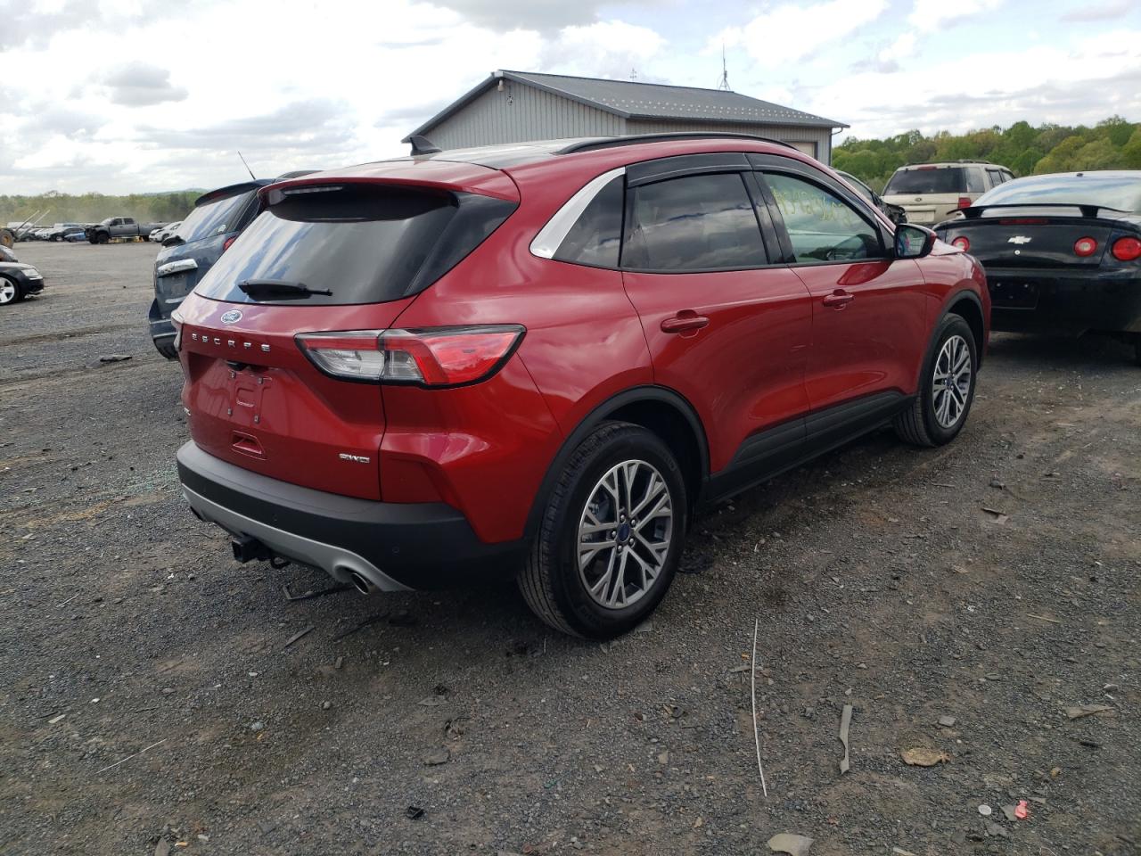 Photo 4 from auction – 2021 FORD ESCAPE SEL with VIN 1FMCU9H97MUB21806