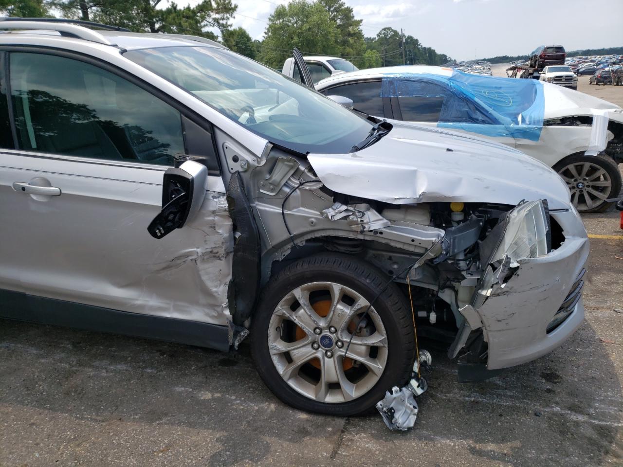 Photo 9 from auction – 2016 FORD ESCAPE TIT with VIN 1FMCU0JX1GUA17627