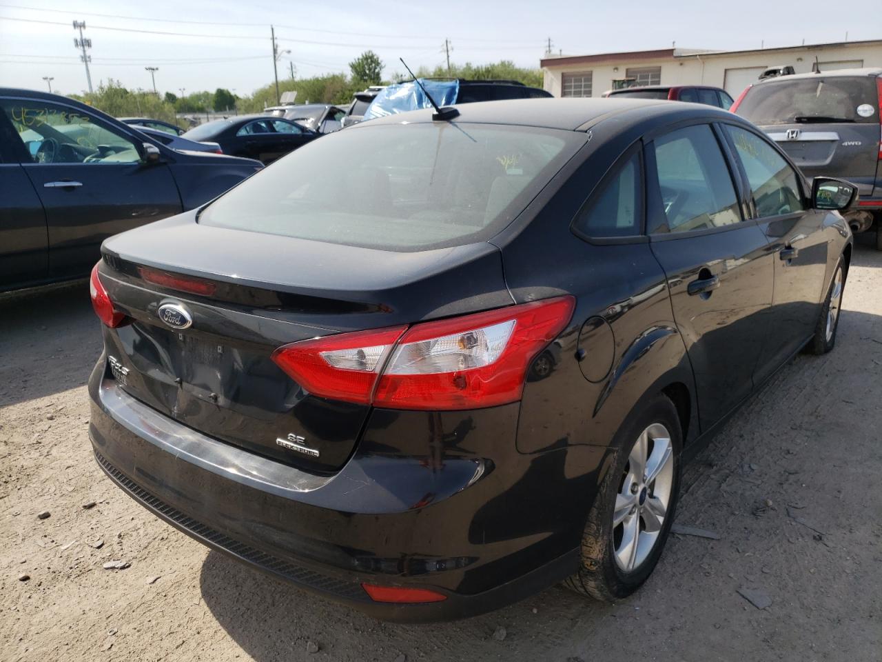 Photo 4 from auction – 2014 FORD FOCUS SE with VIN 1FADP3F21EL207340