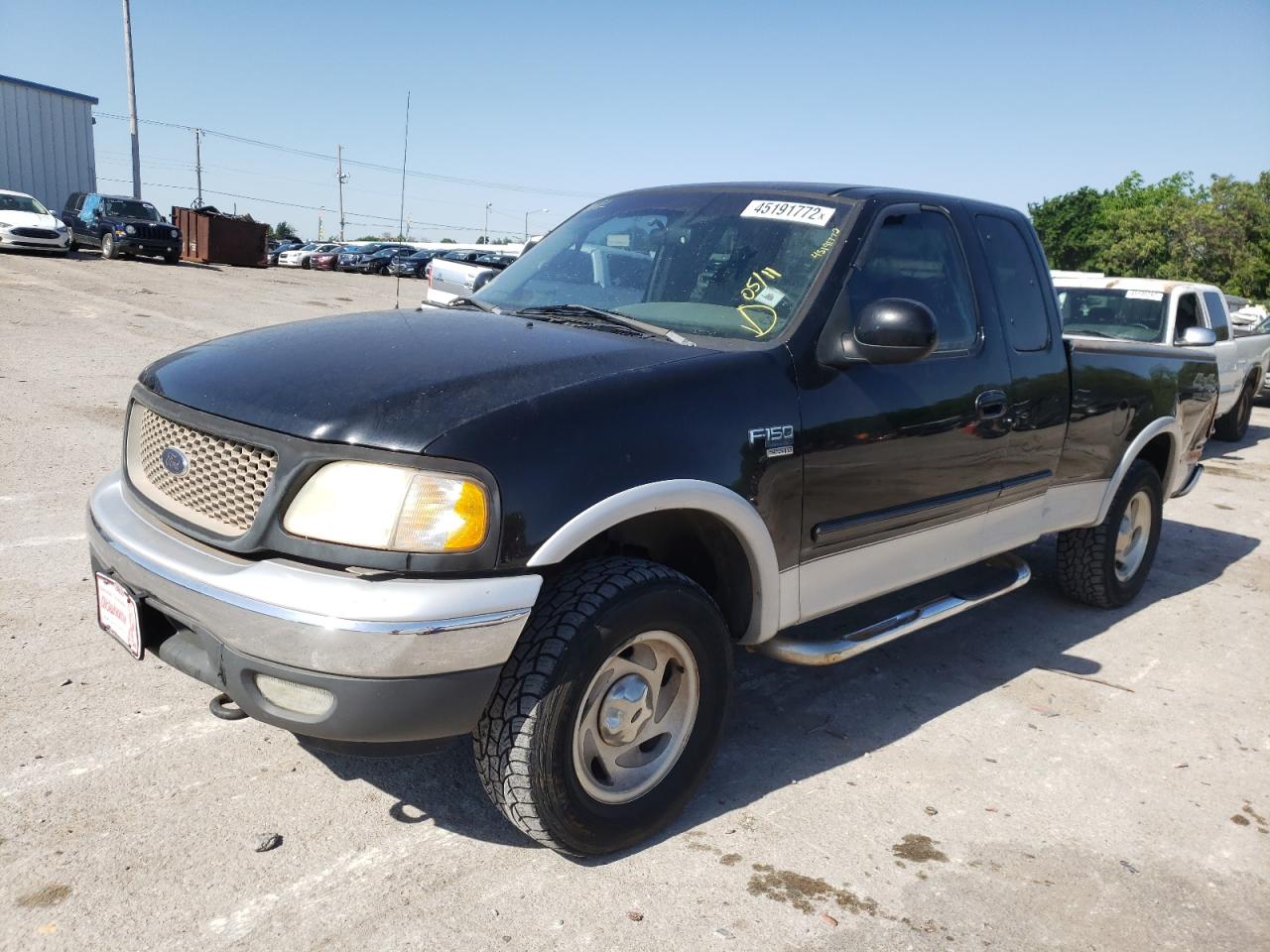 Photo 2 from auction – 2000 FORD F150 with VIN 1FTRX18L8YKA71082