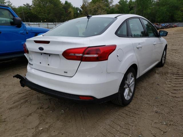 Photo 4 from auction – 2018 FORD FOCUS SE with VIN 1FADP3F20JL222101