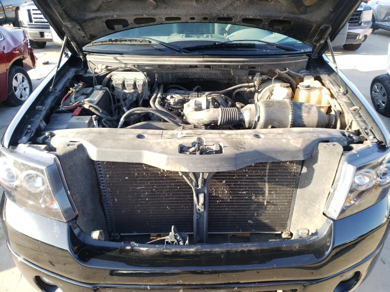 Photo 7 from auction – 2007 FORD F150 with VIN 1FTRF12297NA06452