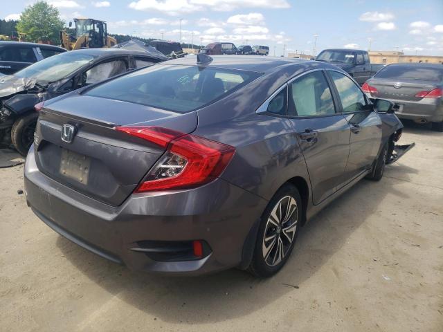 Photo 4 from auction – 2018 HONDA CIVIC EX with VIN JHMFC1F35JX016887