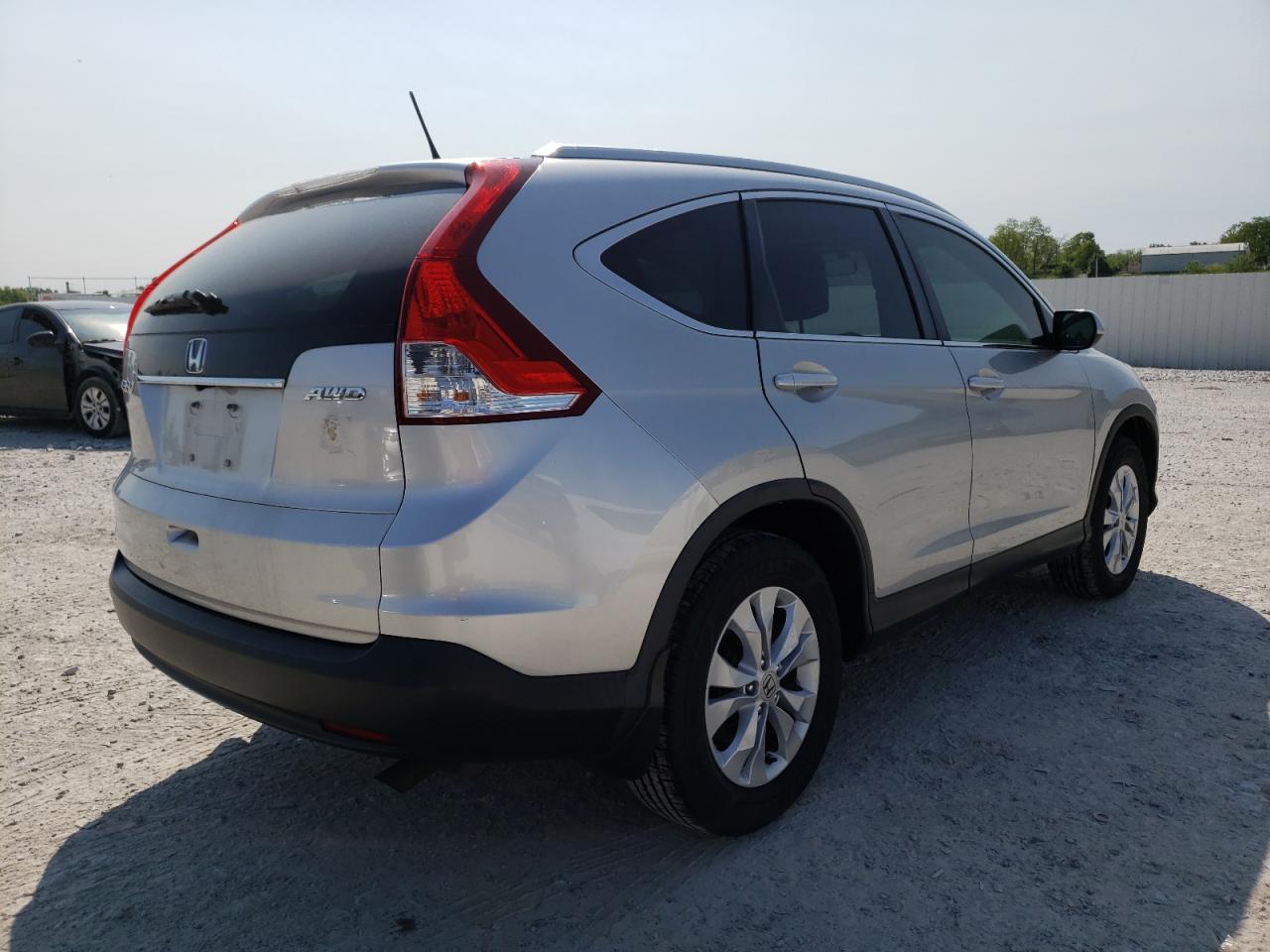 Photo 4 from auction – 2014 HONDA CR-V EXL with VIN 2HKRM4H70EH712796