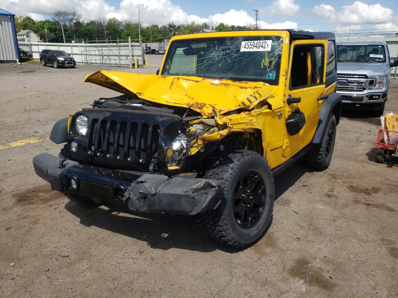 Photo 2 from auction – 2015 JEEP WRANGLER S with VIN 1C4AJWAG1FL706823