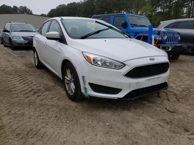 FORD FOCUS SE 2018 with VIN 1FADP3F20JL222101 - Photo from auction