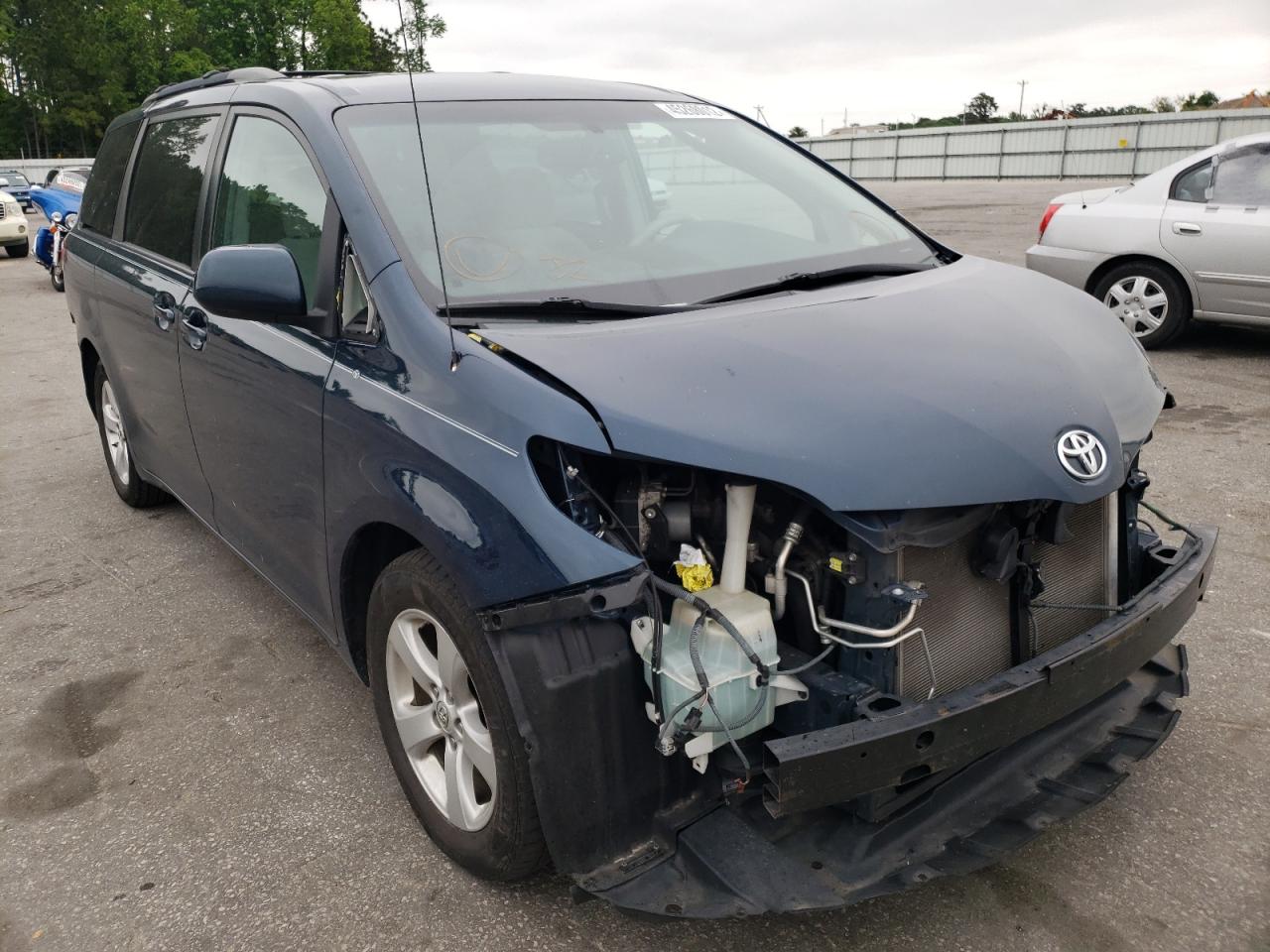 TOYOTA SIENNA LE 2011 with VIN 5TDKK3DC9BS153940 - Photo from auction
