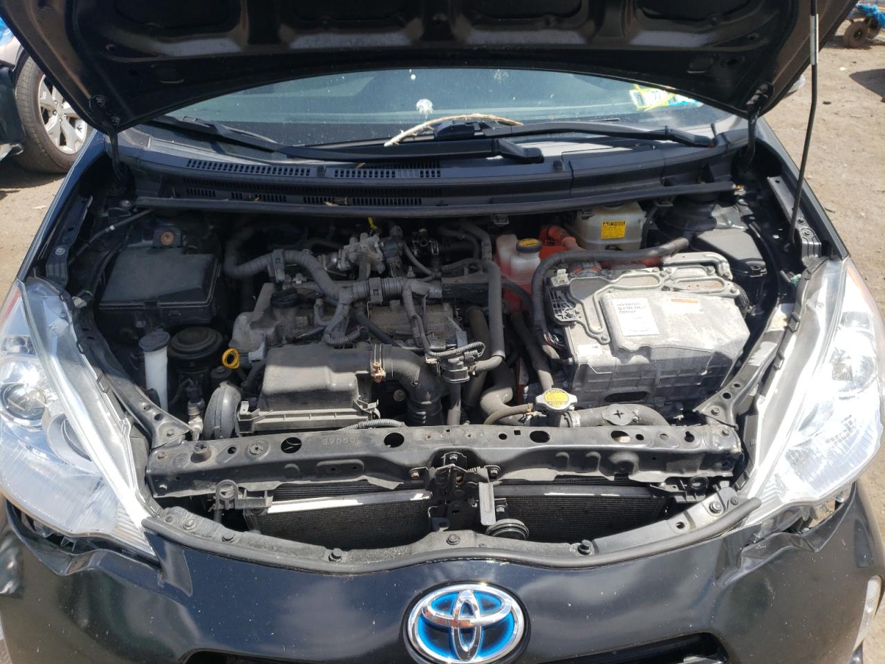 Photo 7 from auction – 2013 TOYOTA PRIUS C with VIN JTDKDTB37D1548096