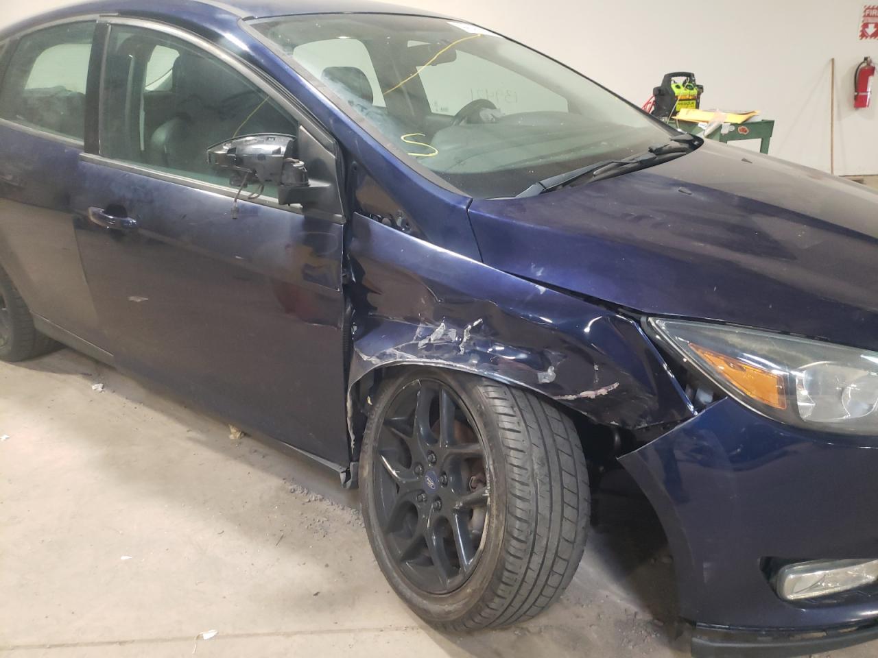 Photo 9 from auction – 2016 FORD FOCUS SE with VIN 1FADP3K22GL312042