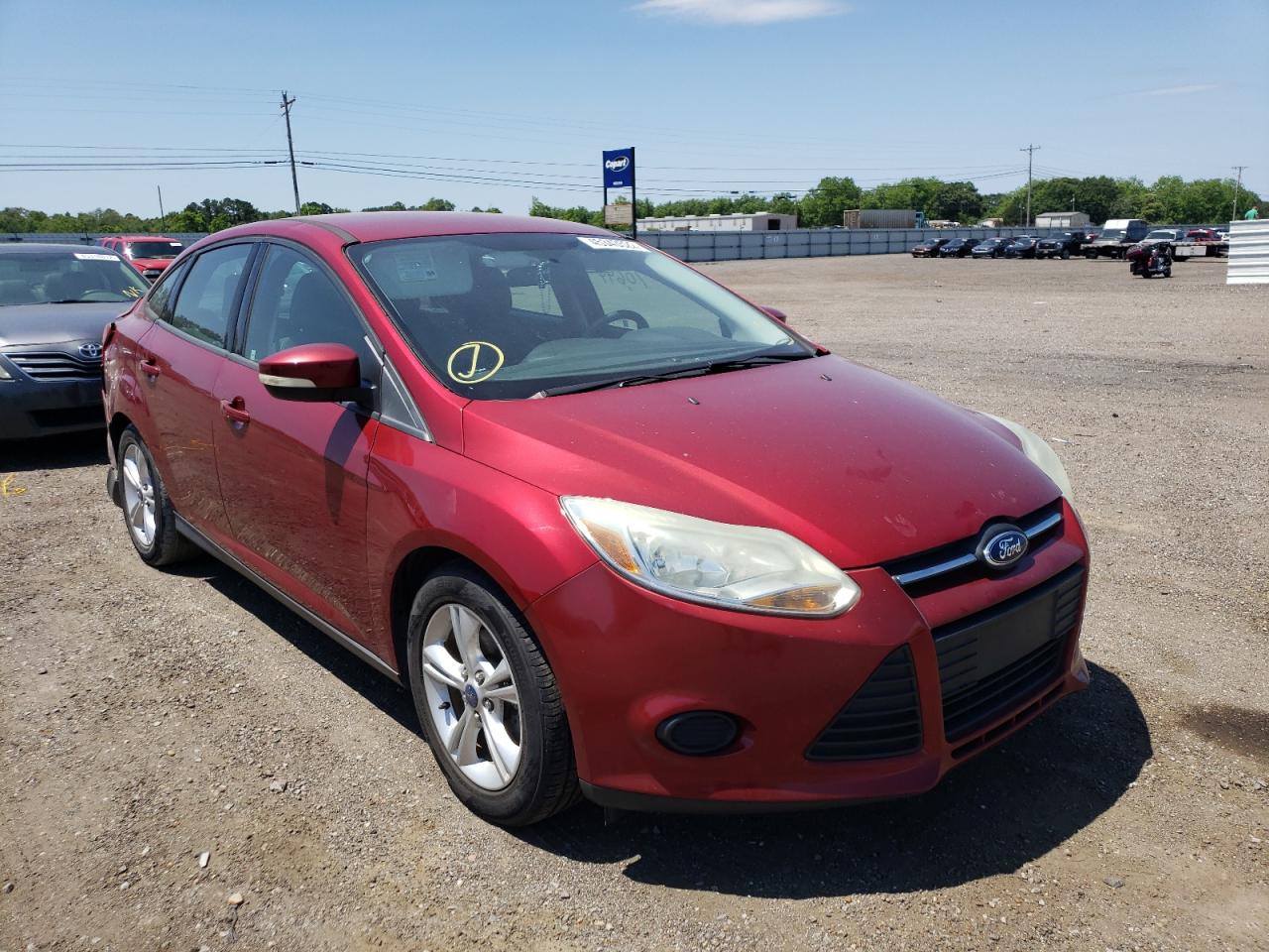 FORD FOCUS SE 2014 with VIN 1FADP3F23EL417258 - Photo from auction