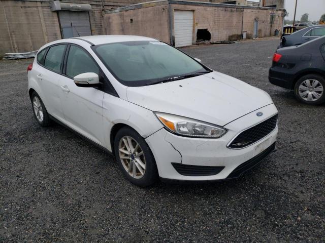 FORD FOCUS SE 2015 with VIN 1FADP3K21FL317750 - Photo from auction