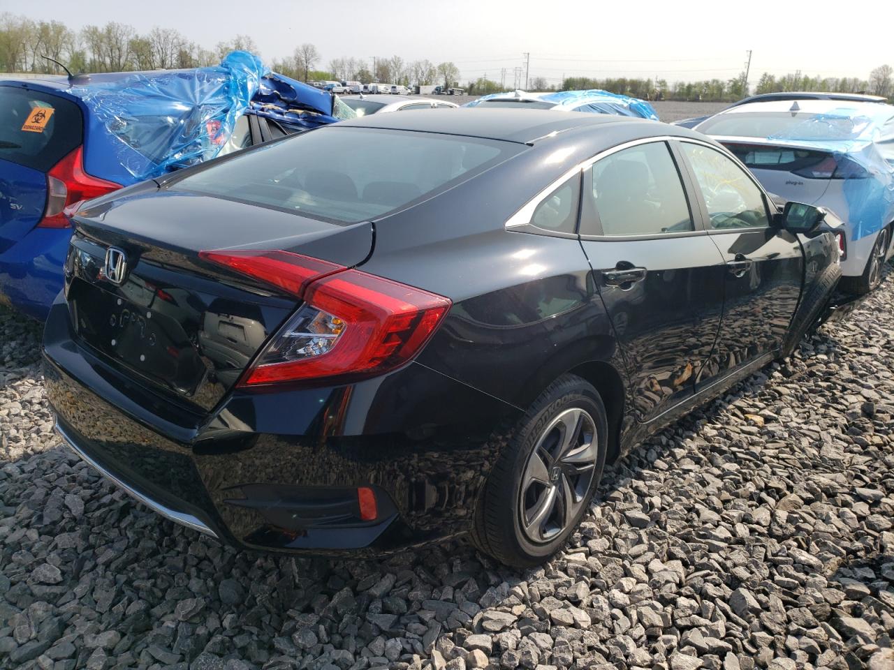 Photo 4 from auction – 2019 HONDA CIVIC LX with VIN 2HGFC2F66KH590908