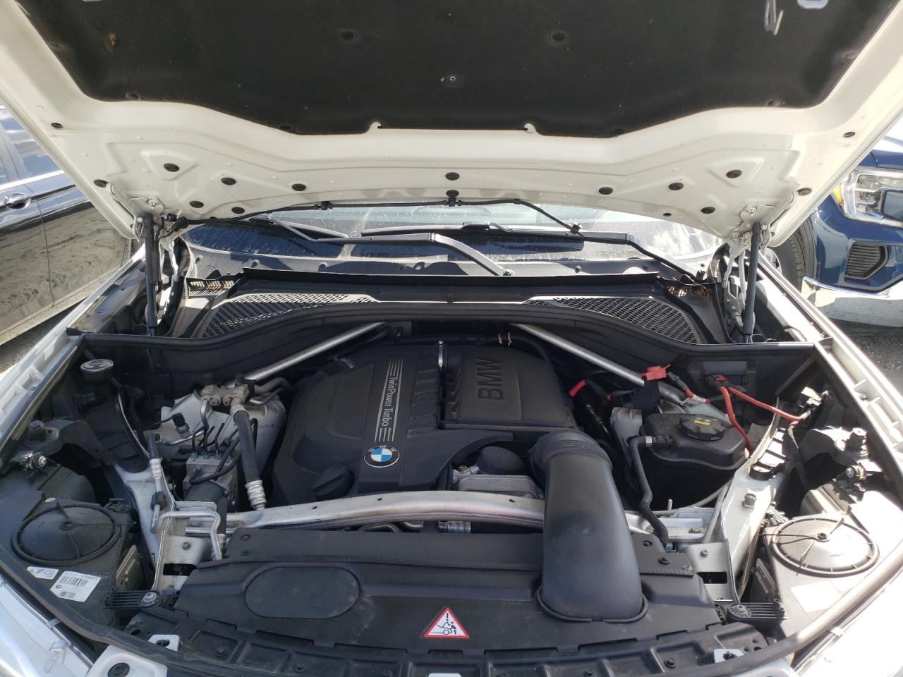 Photo 7 from auction – 2014 BMW X5 XDRIVE3 with VIN 5UXKR0C5XE0K47974