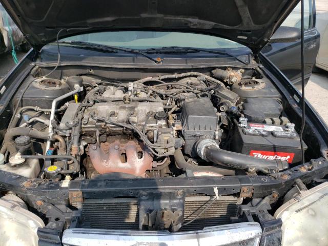 Photo 7 from auction – 2000 MAZDA 626 ES with VIN 1YVGF22C4Y5112423