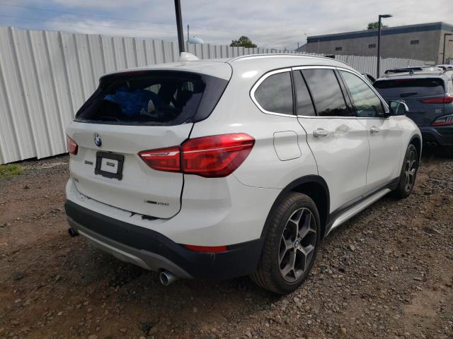 Photo 4 from auction – 2018 BMW X1 XDRIVE2 with VIN WBXHT3C39J5L31023
