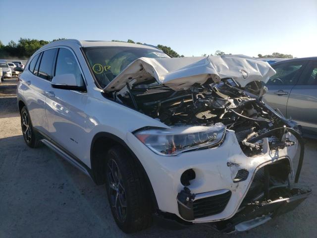 BMW X1 XDRIVE2 2018 with VIN WBXHT3C37J5K30322 - Photo from auction