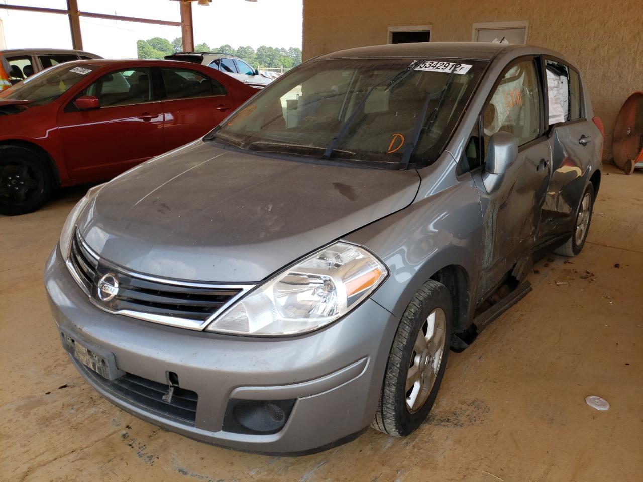 Photo 2 from auction – 2012 NISSAN VERSA S with VIN 3N1BC1CP9CK249038