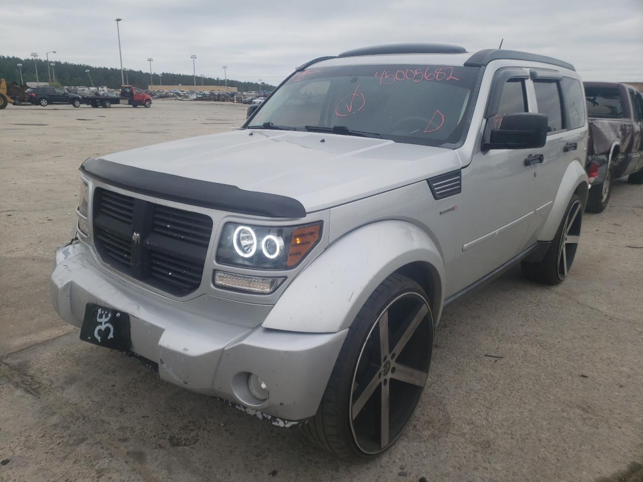 Photo 2 from auction – 2011 DODGE NITRO HEAT with VIN 1D4PT4GKXBW601892