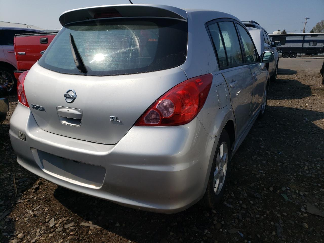 Photo 4 from auction – 2009 NISSAN VERSA S with VIN 3N1BC13E49L419663