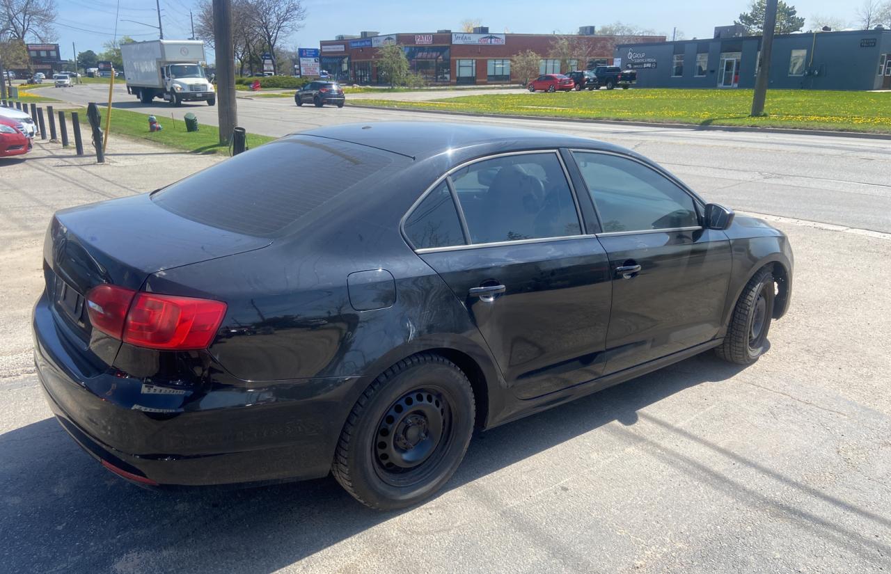 Photo 4 from auction – 2014 VOLKSWAGEN JETTA BASE with VIN 3VW1K7AJ4EM252060