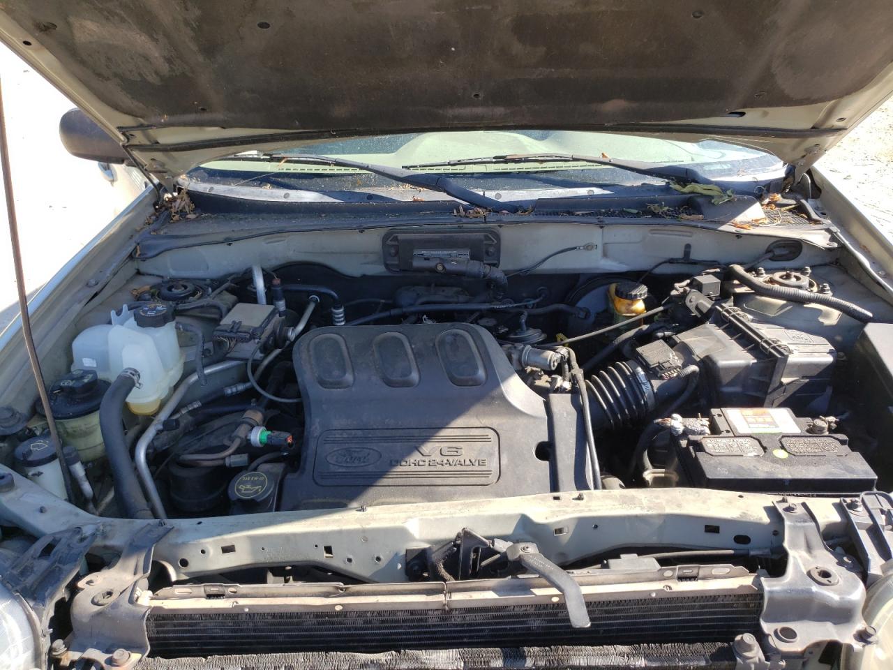 Photo 7 from auction – 2003 FORD ESCAPE LIM with VIN 1FMCU04163KE08835